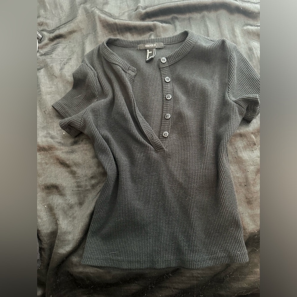 Black top with buttons